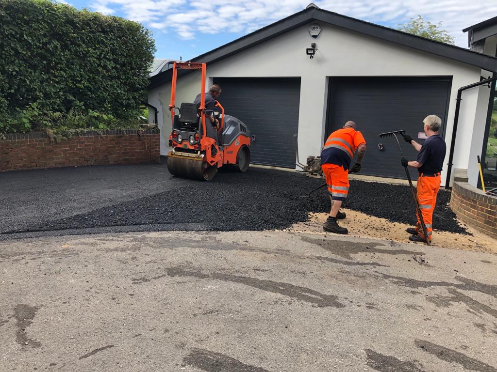 This is a photo of a bitumen driveway which is in the process of being installed by Canungra Asphalt & Bitumen Surfacing