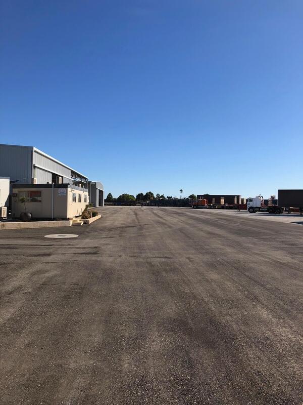 This is a photo of a hardstand driveway which is in the process of being installed by Canungra Asphalt & Bitumen Surfacing